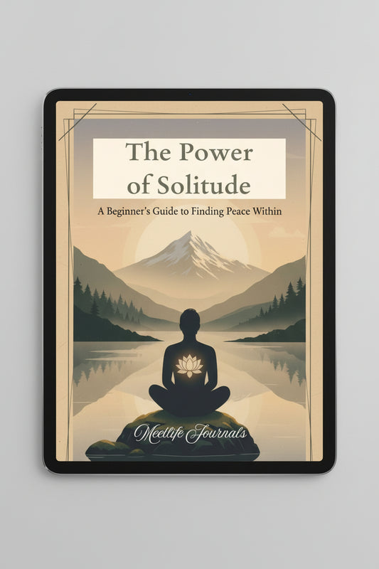 Book cover of 'The Power of Solitude' with a person meditating by a lake and mountains.